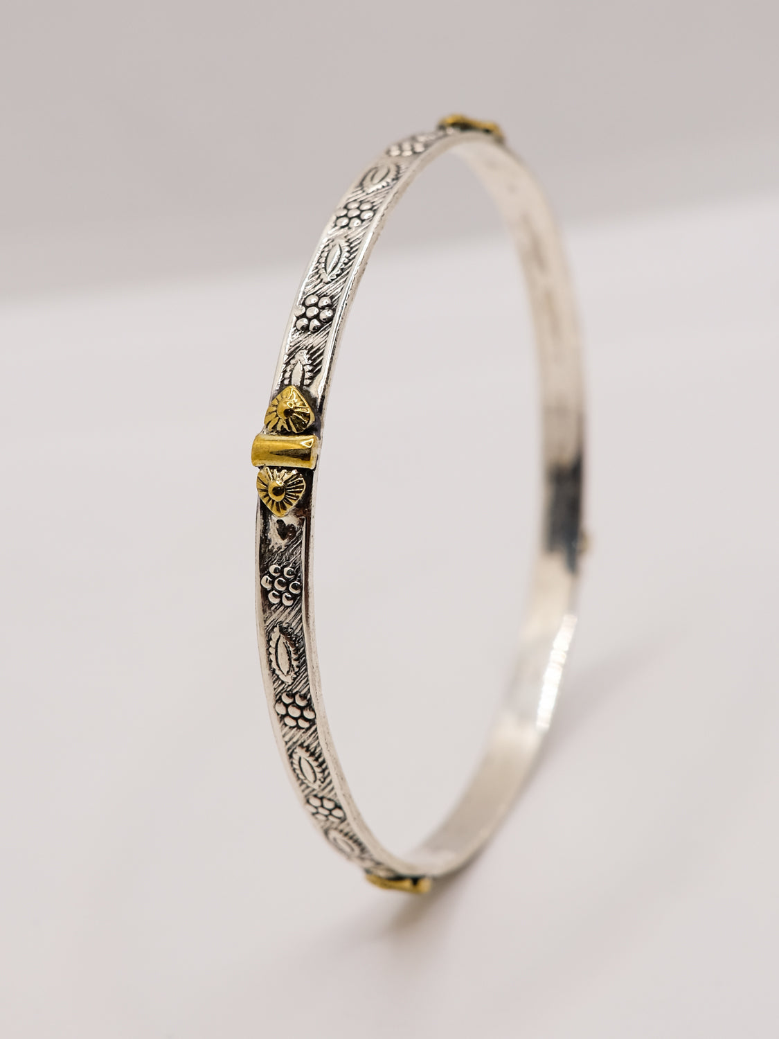 Two tone intricate bangle