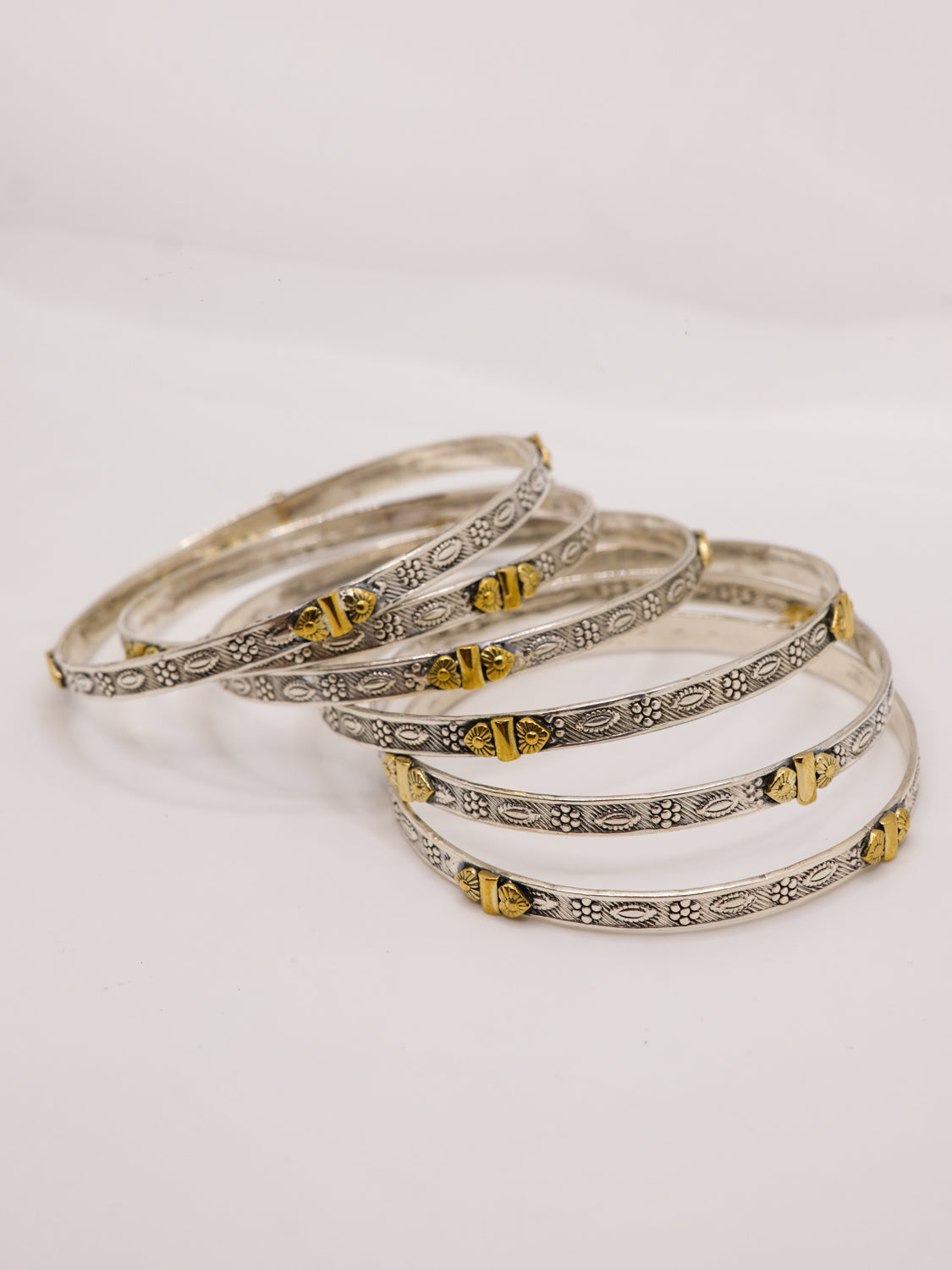 Two tone intricate bangle