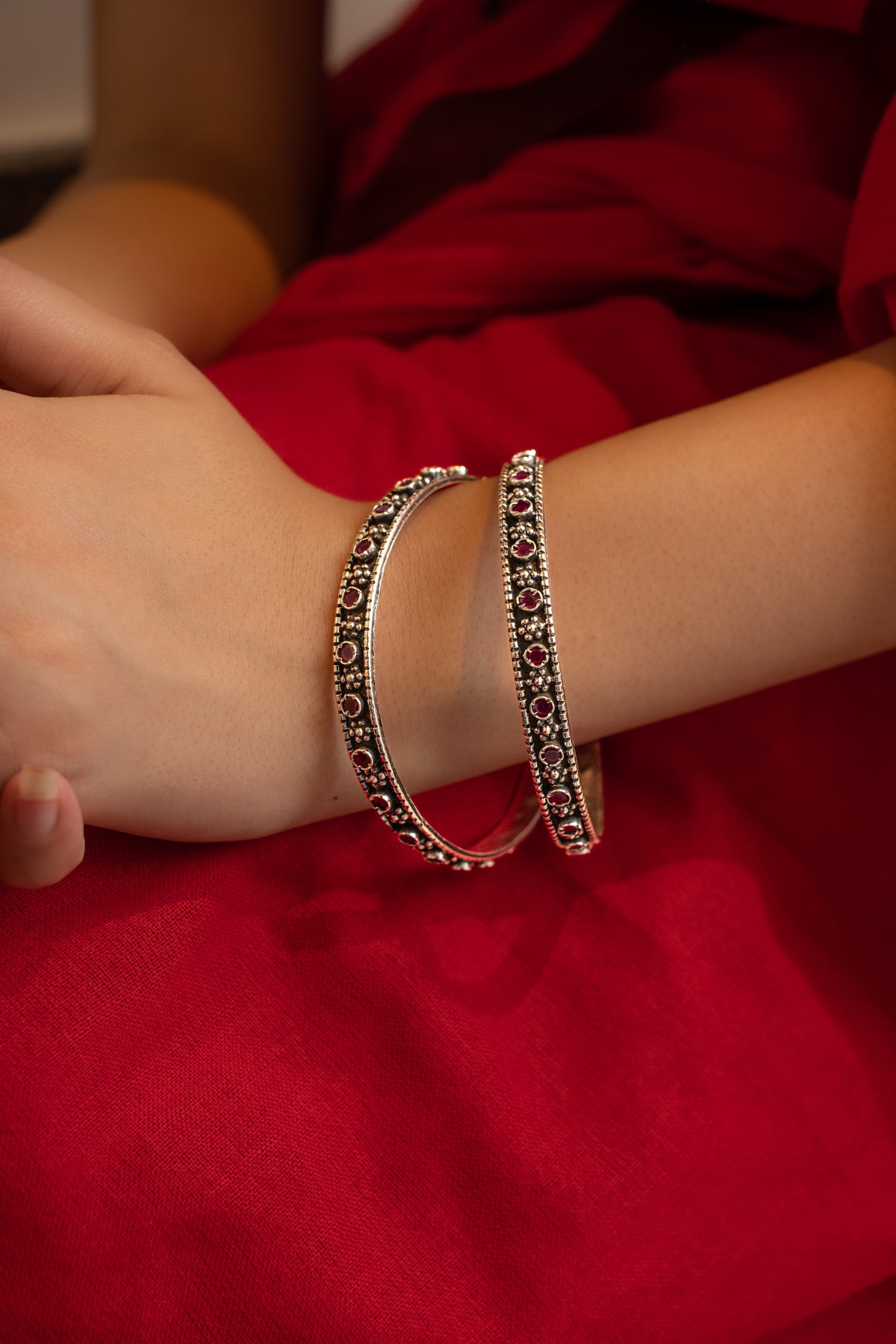 Silver Bangle with Red Gemstones